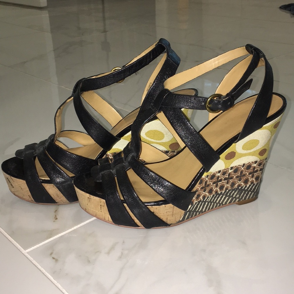 Nine West black wedge sandals.